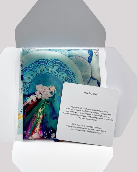 Scarf with a card inside, featuring text and design elements.